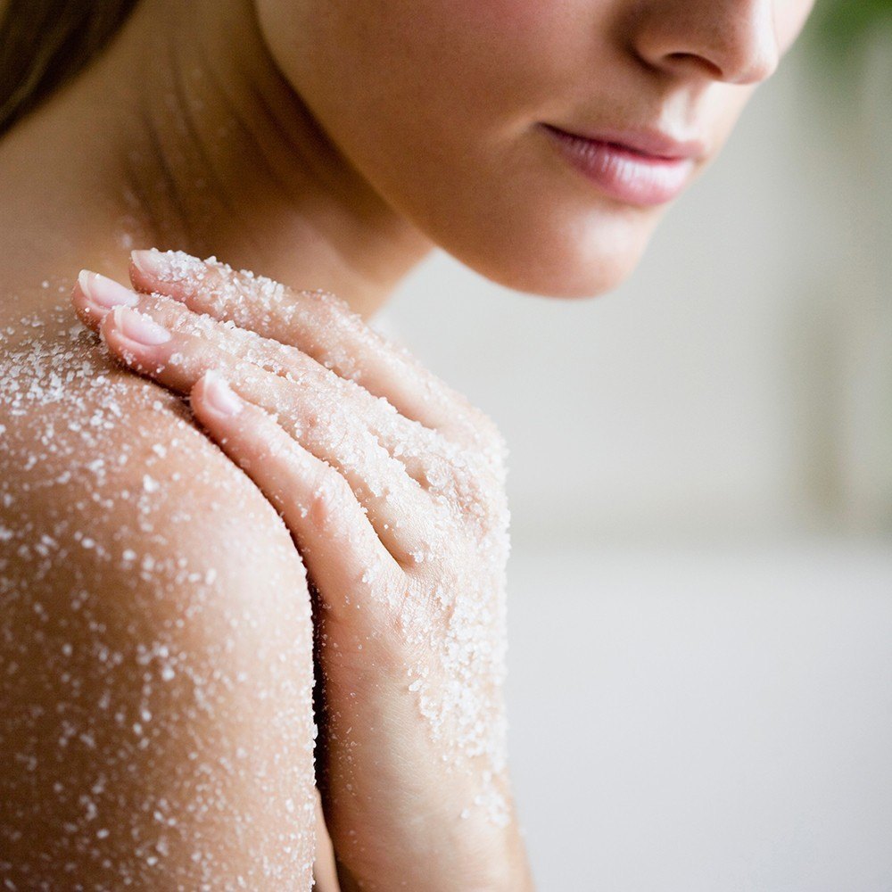 young woman with salt-peeling-mask