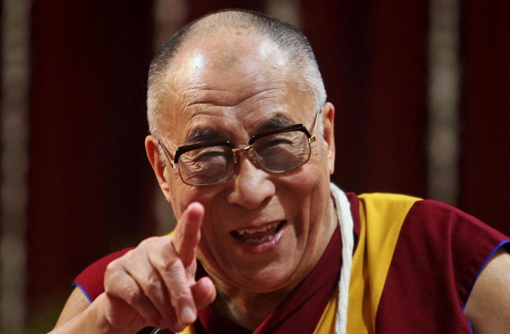 FILE - In this Feb. 18, 2011 file photo, Tibetan spiritual leader the Dalai Lama gestures as he addresses the Mumbai University students in Mumbai, India. The Dalai Lama said Thursday, March 10, 2011, that he will give up his political role in Tibet's government-in-exile, shifting that power to an elected representative. The Tibetan spiritual leader, speaking on the anniversary of the 1959 Tibetan uprising against Chinese control, said the time has come "to devolve my formal authority to the elected leader." (AP Photo/Rafiq Maqbool, File)
